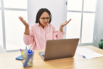 Canvas Print - Young african american woman having video call arguing at office