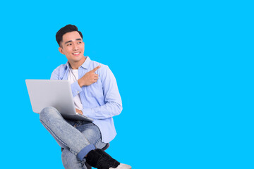 Stylish man dressed casual  and working with laptop