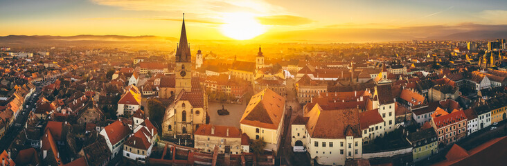 Wall Mural - Aerial view over Sibiu city in Transylvania, Romania, during an amazing sunset over the centre old town