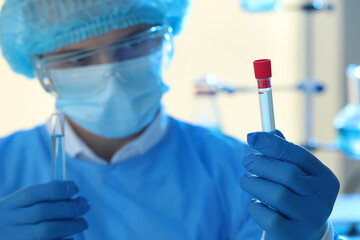 Poster - Scientist working with samples in laboratory, focus on hand. Medical research