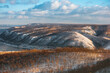© KseniaJoyg - Amazing winter landscape in the mountains, top view. The snow lies on the mountains and the trees are covered with ice. Russia, Togliatti