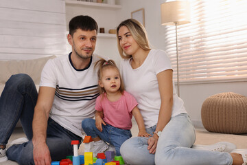 Sticker - Family with little daughter spending time together at home