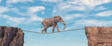 Elephant walks on slackline rope above a gap between two mountain peaks.