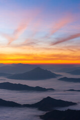 Wall Mural - Landscape and starscape of the mountain and sea of mist in winter sunrise view from top of Phu Chi Dao mountain , Chiang Rai, Thailand