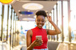 © pikselstock - Young woman using mobile phone outdoors