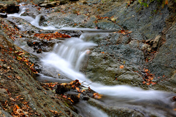 Wall Mural - small waterfall on mountain river