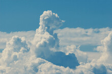 Animal Shaped Cloud Resembling Meerkat In A Blue Sky