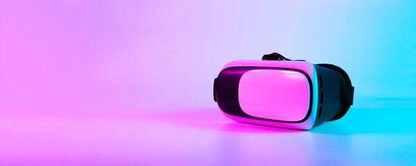 VR headset virtual reality. 3d digital glasses on futuristic neon tech background. Innovation device, cyberspace technology.