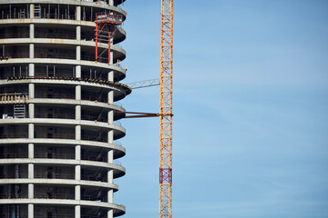 Construction site with unfinished buildings.