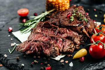 grilled steak Ribeye Black Angus medium rare beef. vertical image. top view. place for text