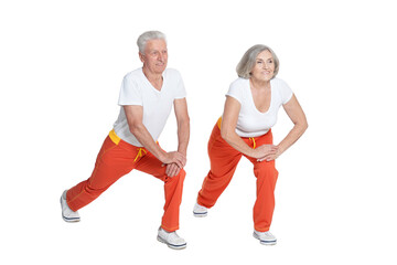 Senior couple exercising isolated on white background