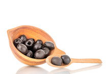 A Few Pickled Black Olives In A Wooden Bowl With A Wooden Spoon, Macro, Isolated On White.