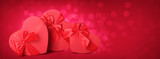 Fototapeta Mapy - Gifts for Valentine's Day on red background with space for text