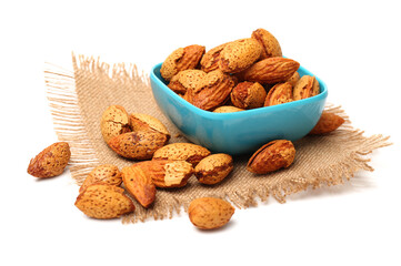 Wall Mural -  almonds nuts on white background.