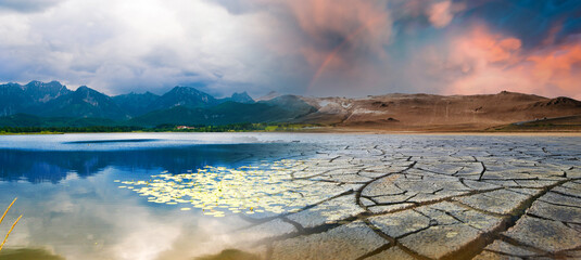 landscape with mountains and a lake and a dried desert. global climate change concept