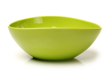 Poster - Bright green plastic empty bowl on a white background 