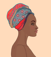 Wall Mural - Portrait of beautiful African woman in turban (profile view)