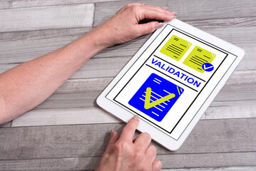 Wall Mural - Validation concept on a tablet