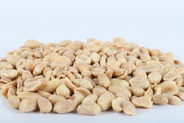 Wall Mural - Brown peanuts isolated on white background top view