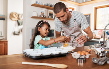 Canvas Print - Adding all the ingredients to make some delicious cupcakes