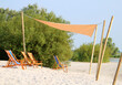 © Ines Porada - Deckchairs under shade sail at the beach - summer scene (Hindeloopen, Frisia, Netherlands)
