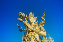 Wat Rong Khun,Chiangrai,in The Thailand On Blue Sky Background.(Wide-angle Lens)