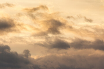 Wall Mural - clouds on the sky in golden hour light. warm weather in summer at sunset