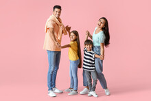 Happy Dancing Family On Color Background