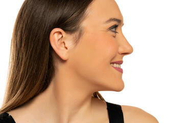 Wall Mural - Profile of a young beautiful happy woman with makeup