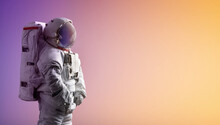 Astronaut Stay On Isolated Background With Gradient Color. Spaceman Alone. Creative Sci-fi Space Wallpaper With Light. Elements Of This Image Furnished By NASA
