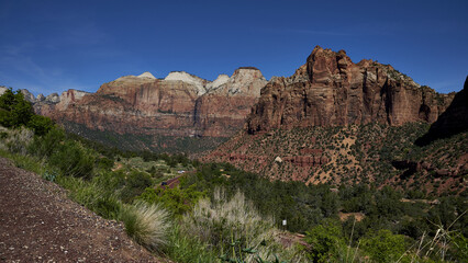 Sticker - An amazing view of the rocky landscapes of Zion National Park against the blue sky in the USA