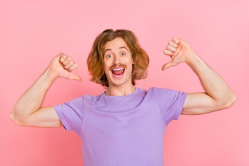 Sticker - Portrait of attractive cheerful cool confident guy demonstrating himself isolated over pink pastel color background