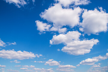 Wall Mural - blue sky background with white clouds