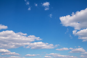 Wall Mural - blue sky background with white clouds