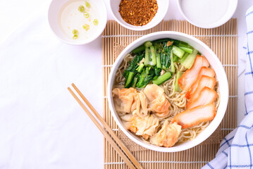 Canvas Print - Noodles soup with wonton dumpling and grilled red pork, Asian food, Top view