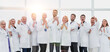© ASDF - tight-knit group of medical center doctors applauding together.