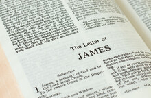 Apostle James Epistle Letter Open Holy Bible Book Close-up. New Testament Scripture. Studying The Word Of God Jesus Christ. Christian Biblical Concept Of Love, Faith, Trust.