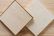 © eugen - shallow wooden boxes upside down on a wooden surface