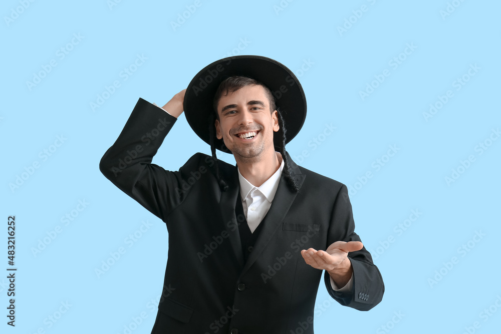 Hasidic Jewish man on color background