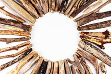 Background With A Round Frame Of Sea Driftwood On A White Background Top View