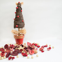Christmas Tree And Red Potpourri With White Background