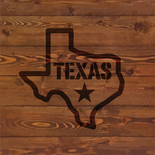 Texas State Symbol Branded On Old Wood Wall