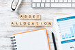 Asset allocation concept with letters on cubes.