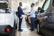 © Prostock-studio - Auto Showroom Manager Shaking Hands With Male Customer After Successful Deal
