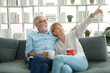 © tonefotografia - Happy Caucasian seniors couple are drinking coffee in home , relaxing and health care concept .