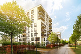 Fototapeta Londyn - Cityscape of a residential area with modern apartment buildings, new green urban landscape in the city