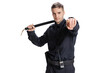 © master1305 - Half-length portrait of young male policeman officer wearing black uniform posing isolated on white background. Concept of job, caree, law and order.