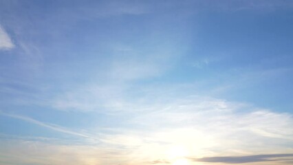 Wall Mural - beautiful sunny clear blue sky 4k video background. birds flying at sunset time