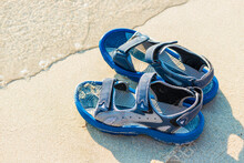A Pair Of Sandals On A Tropical Beach