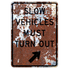 Wall Mural - Old rusty American road sign - Slow vehicles must turn out